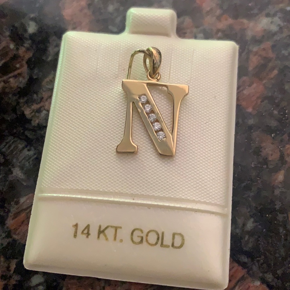 “N” initial pendant 14 karat yellow gold